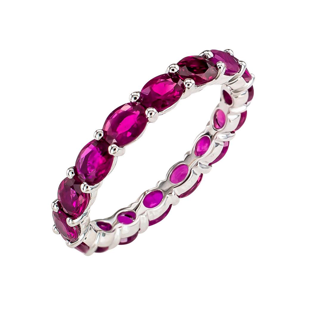 Ruby and white gold eternity ring, size 6.5.  Clear and concise information you want to know is listed below.  Contact us right away if you have additional questions.  We are here to connect you with beautiful and affordable jewelry.  It is