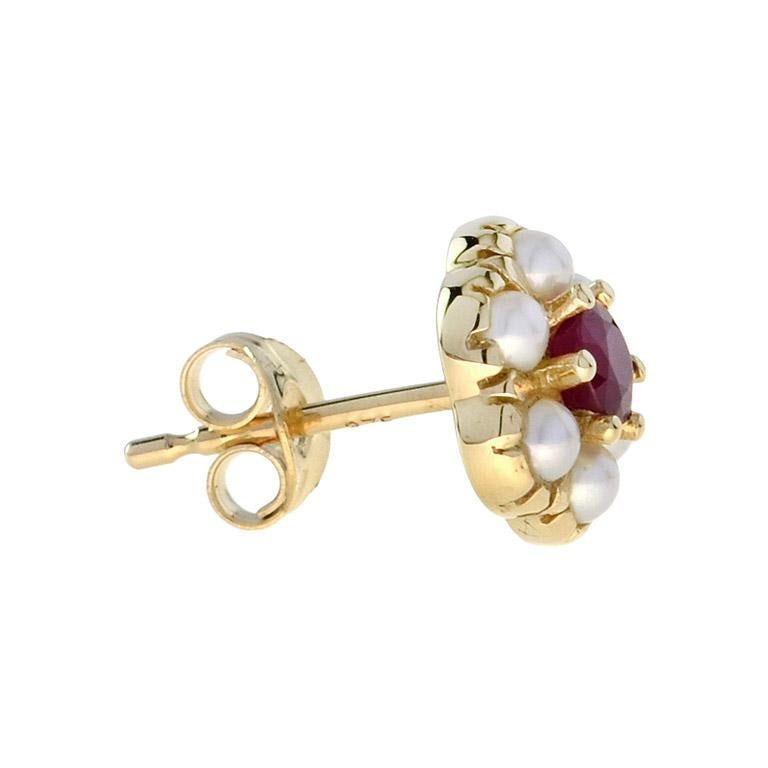 Bring a touch of a lovely floral design to your wardrobe with this pair of ruby and diamond stud earrings arranged in the shape of an antique bloom.
Information
Metal: 14K Yellow Gold
Width: 8 mm.
Length: 9 mm.
Weight: 1.90 g. (approx. total