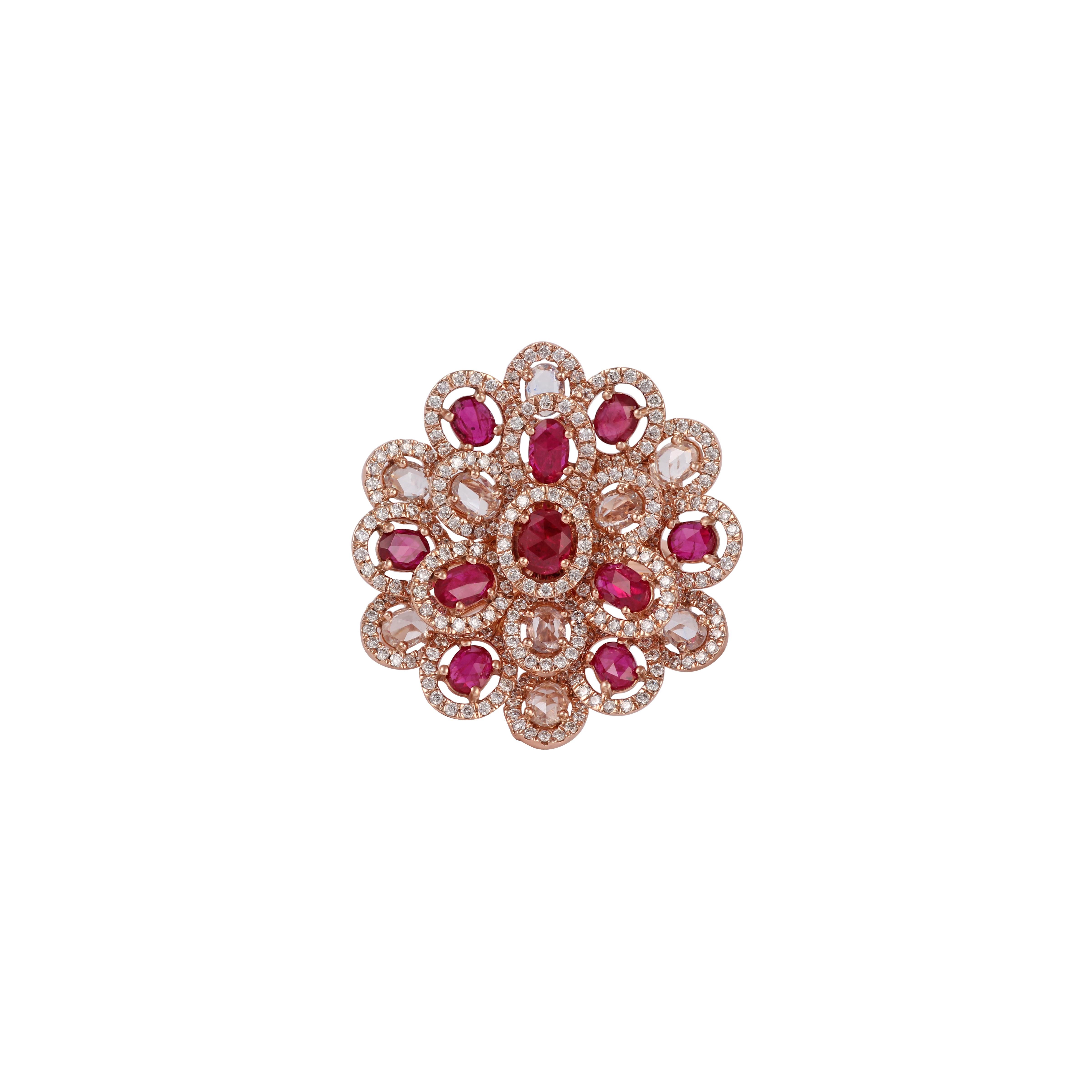 Its an exclusive cocktail ring studded in 18k rose gold with 10 pieces oval shaped rose cut rubies weight 2.01 carat & 9 pieces oval shaped rose cut white sapphires weight 1.39 carat with 302 pieces of round shaped brilliant cut diamond weight 1.46