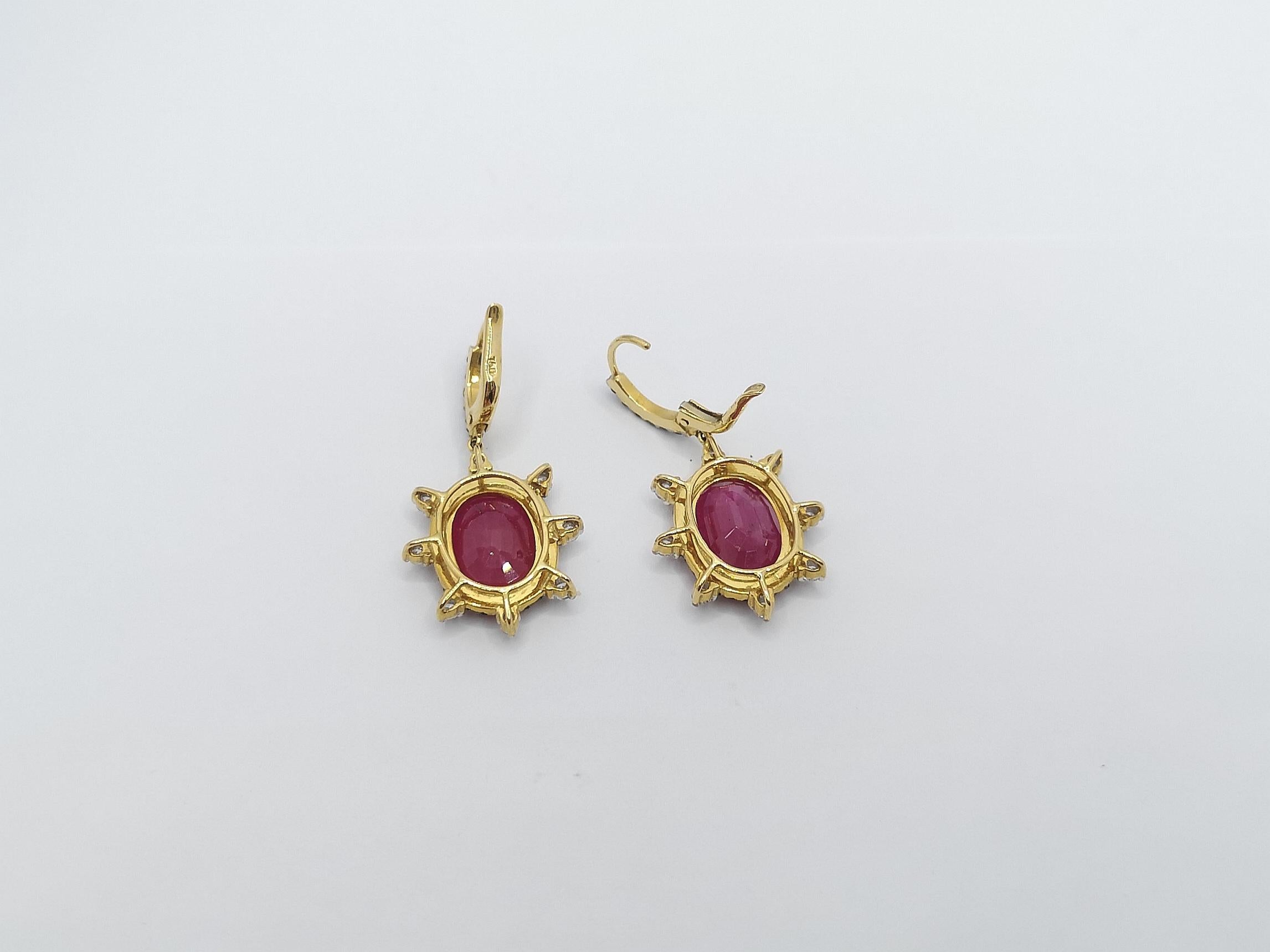 Oval Cut Ruby with Black Diamond and Diamond Earrings Set in 18 Karat Gold Settings For Sale