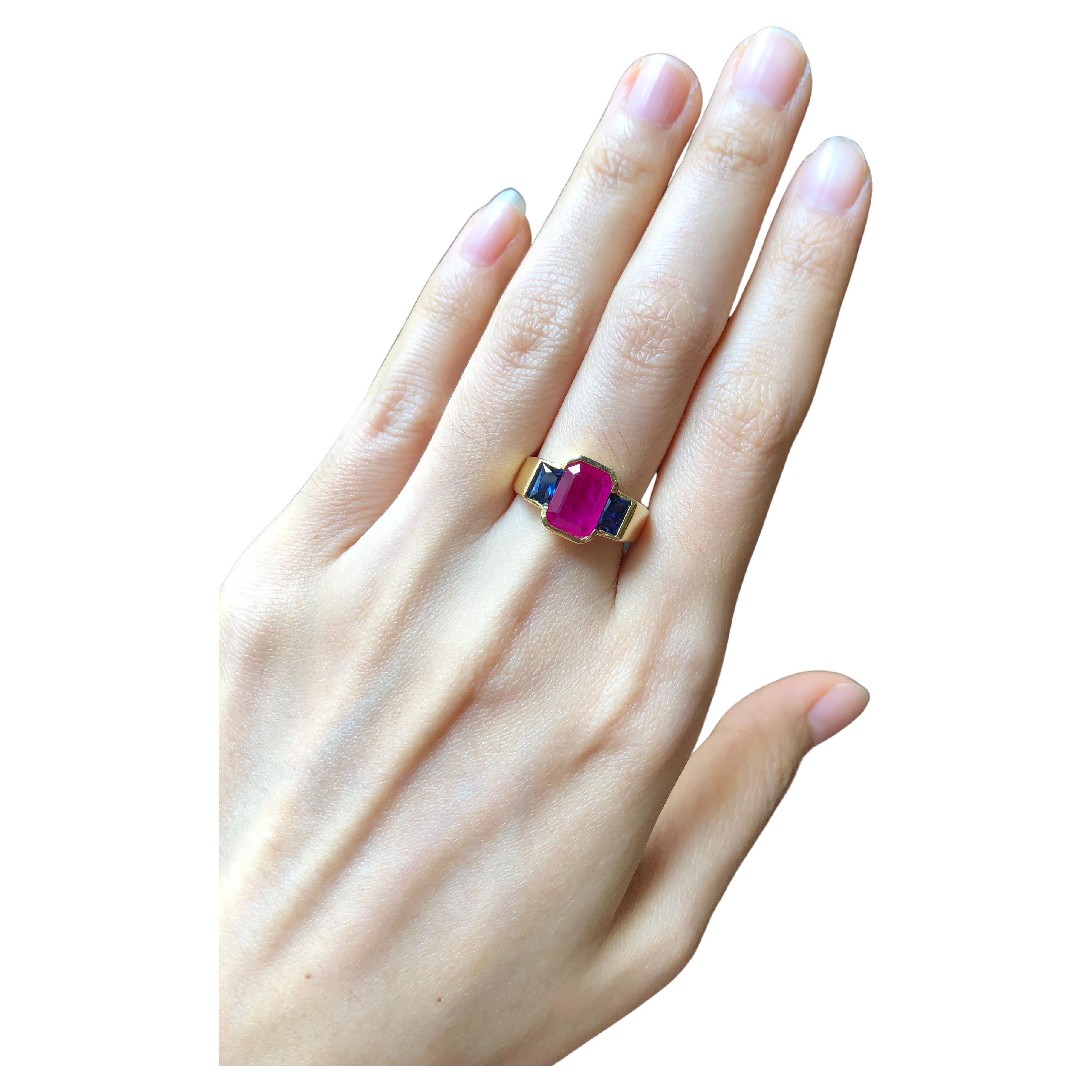 Ruby 1.87 carats with Blue Sapphire 1.20 carats Ring set in 18 Karat Gold Settings

Width:  1.5 cm 
Length: 1.0 cm
Ring Size: 52
Total Weight: 7.07 grams

