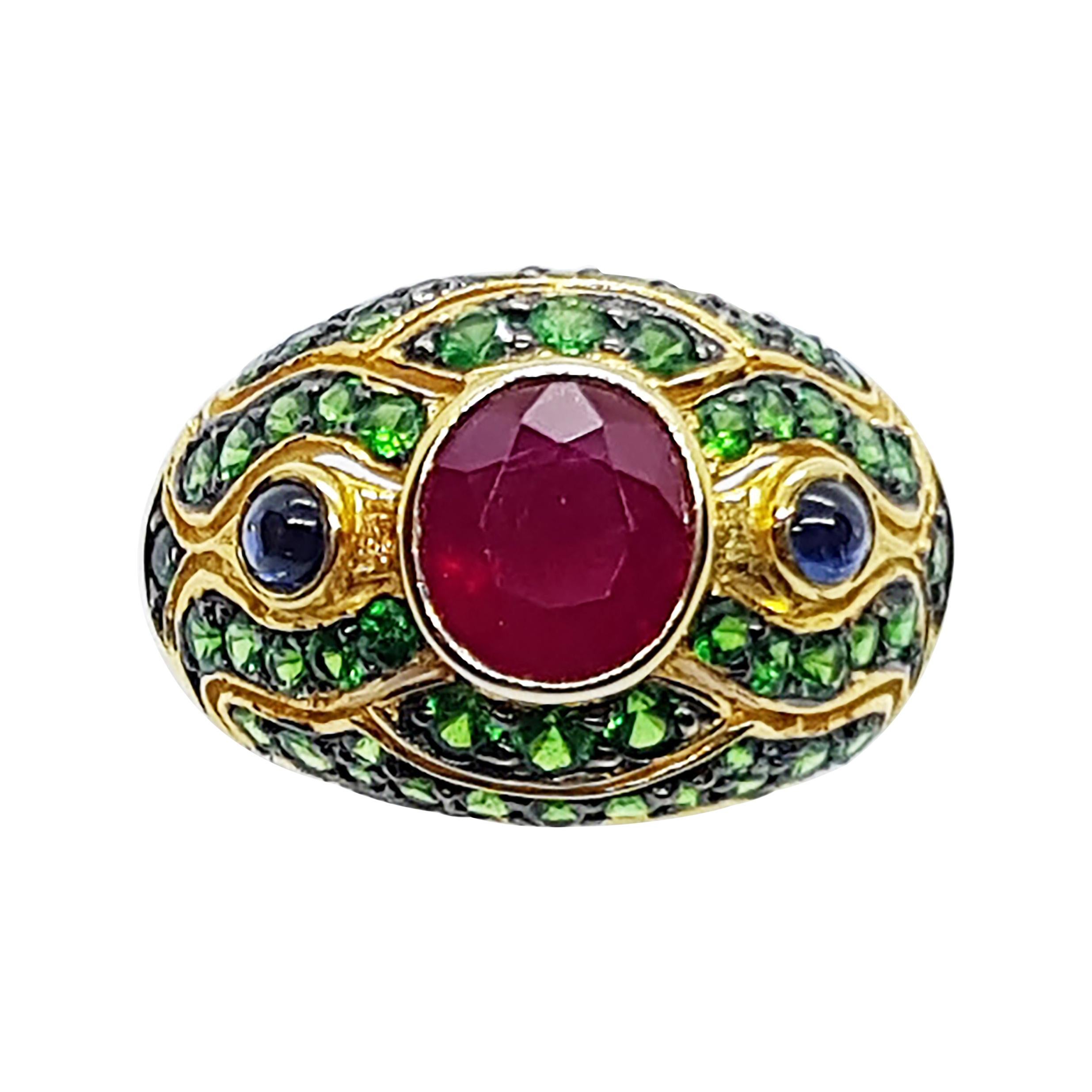 Ruby with Cabochon Blue Sapphire and Tsavorite Ring Set in 18 Karat Gold Setting