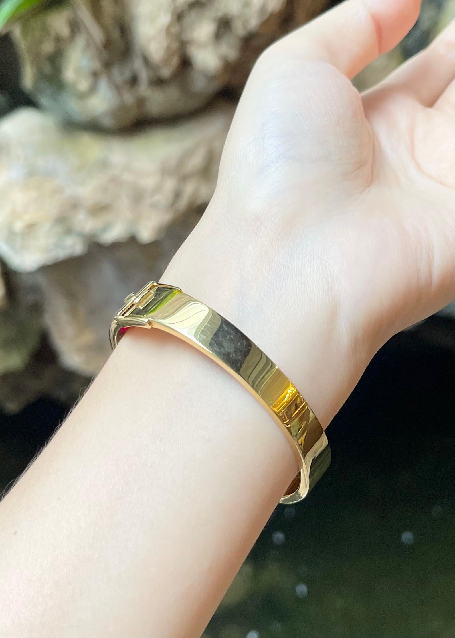 Oval Cut Ruby with Diamond Bangle set in 18K Gold Settings For Sale