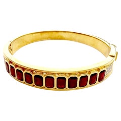 Ruby with Diamond Bangle set in 18K Gold Settings