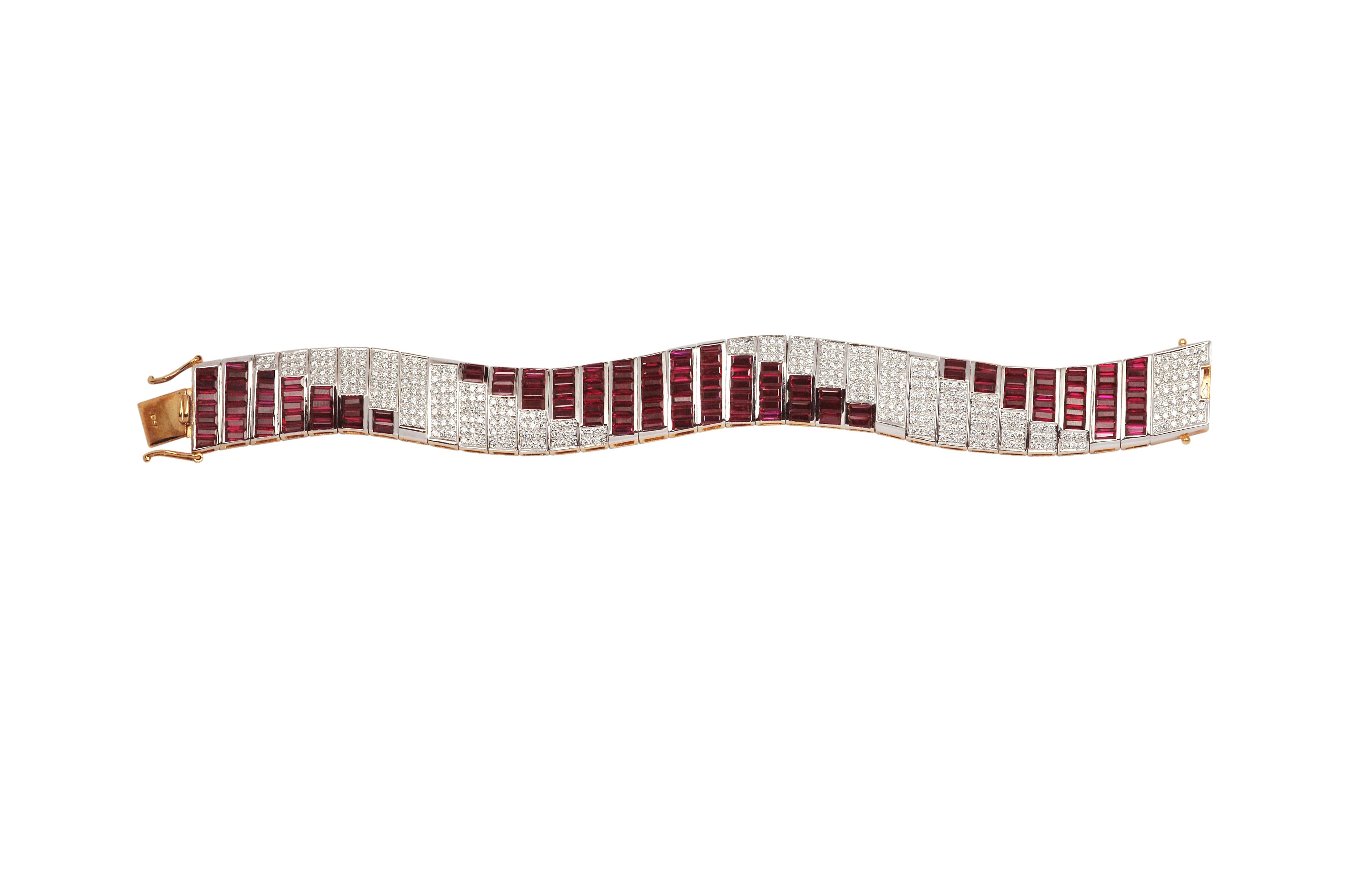 Ruby 3.36 carats with Diamond  18.83 carats Bracelet set in 18 Karat Gold Settings

Width: 1.5 cm
Length: 18.5 cm 
This Art Deco inspired Ruby and Diamond bracelet is simple yet elegant. A clean slat of baguette ruby and round diamonds completes the
