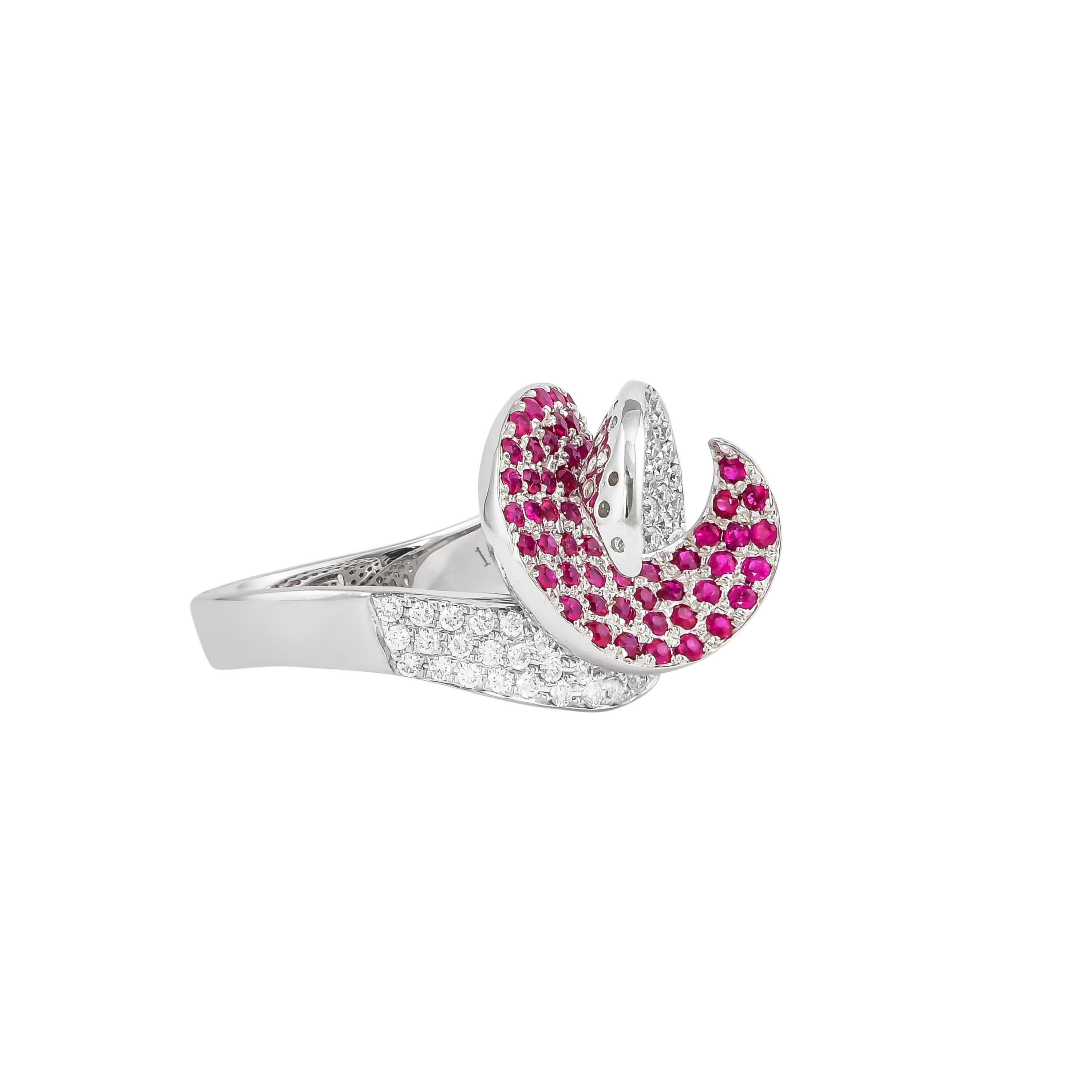 Sunita Nahata presents a collection of fancy cocktail rings with gorgeous gemstones. This ring uses a pave structure of pave set ruby and diamonds woven structurally woven together. This unique and contrasting design presents a striking cocktail