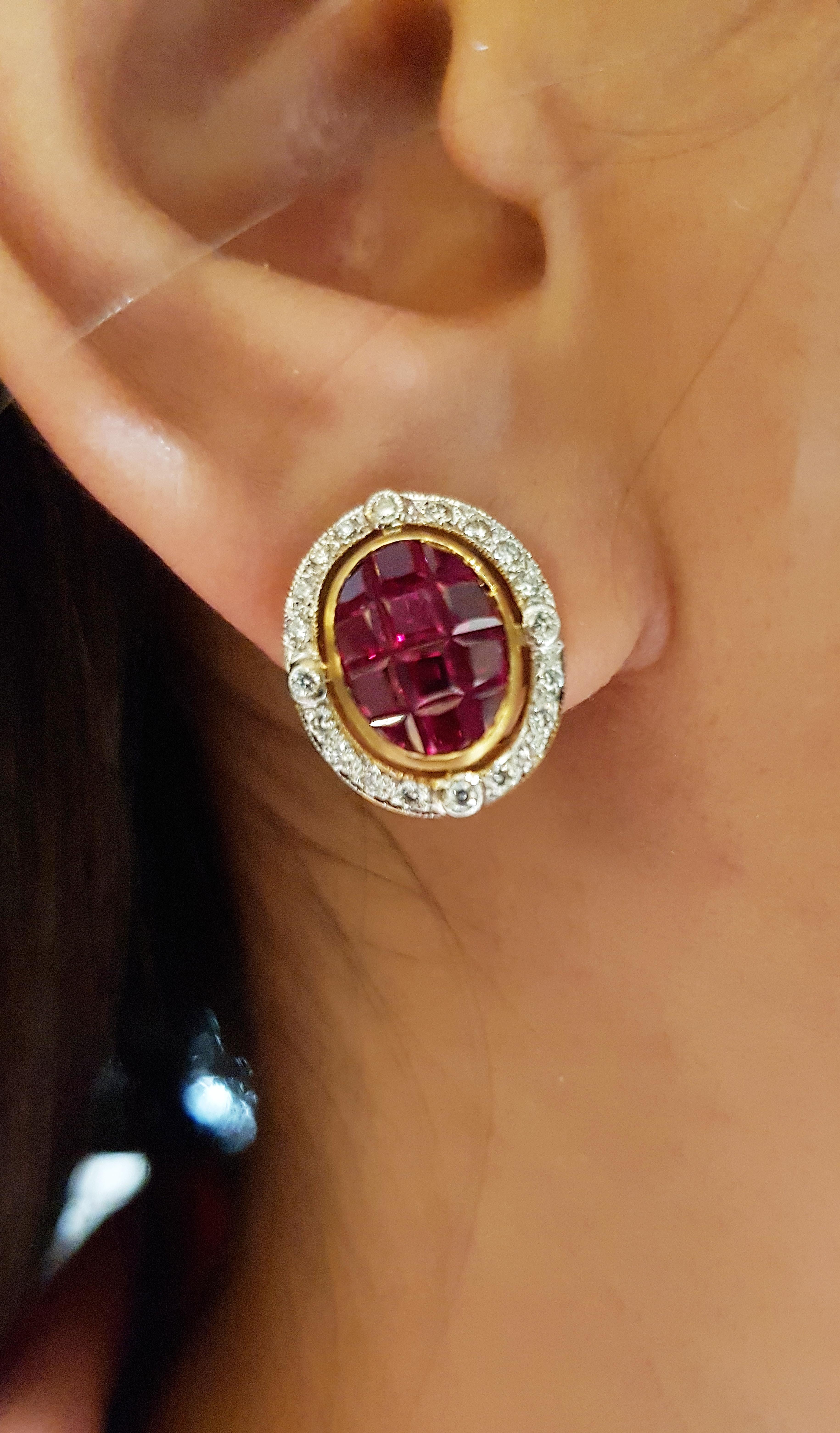 Ruby 7.60 carats with Diamond 0.34 carat Earrings set in 18 Karat Gold Settings

Width: 1.3 cm 
Length: 1.5 cm
Total Weight: 8.06 grams

