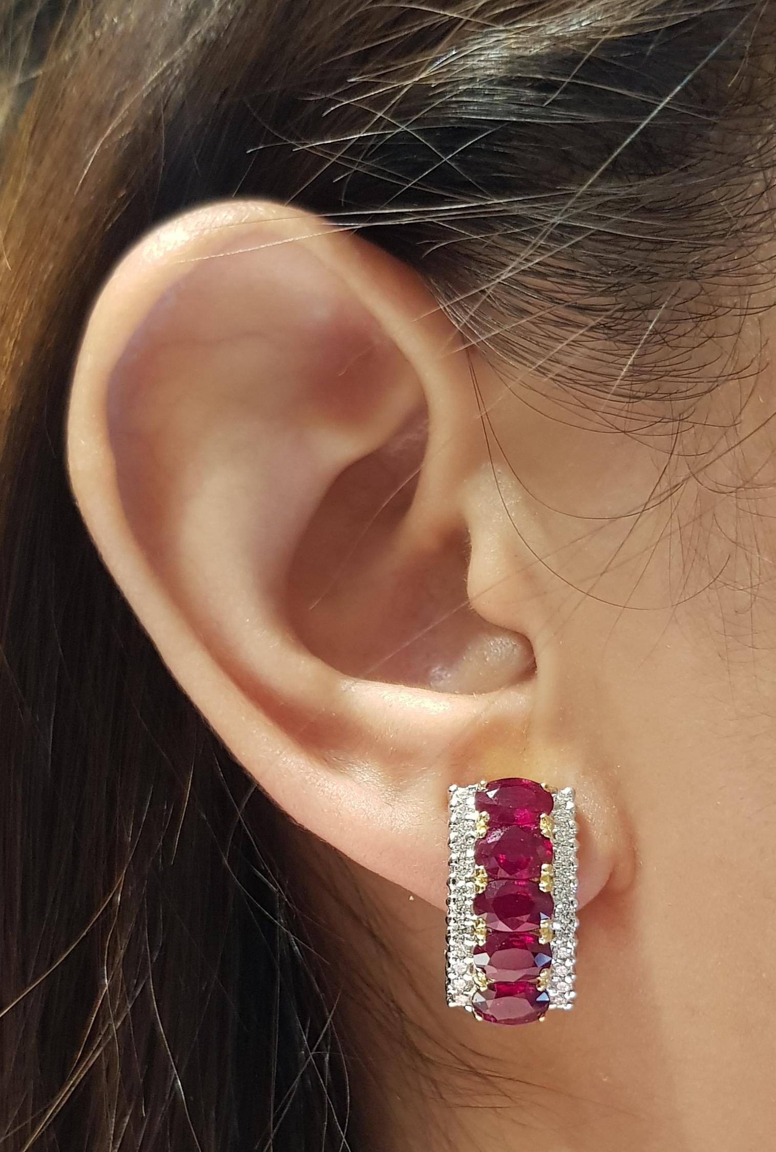 Ruby 5.52 carats with Diamond 0.58 carat Earrings set in 18 Karat Gold Settings

Width:  1.0 cm 
Length: 1.7 cm
Total Weight: 11.44 grams

