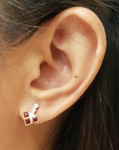 Orecchini di rubini e diamanti con montatura in oro 18 carati