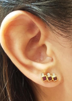 Pendientes de rubí con diamantes engastados en oro de 18 quilates
