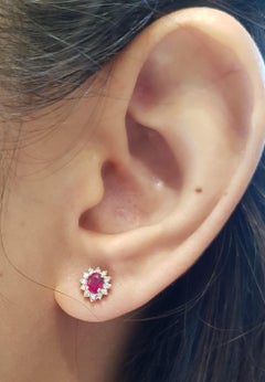 Orecchini di rubini e diamanti con montatura in oro 18 carati