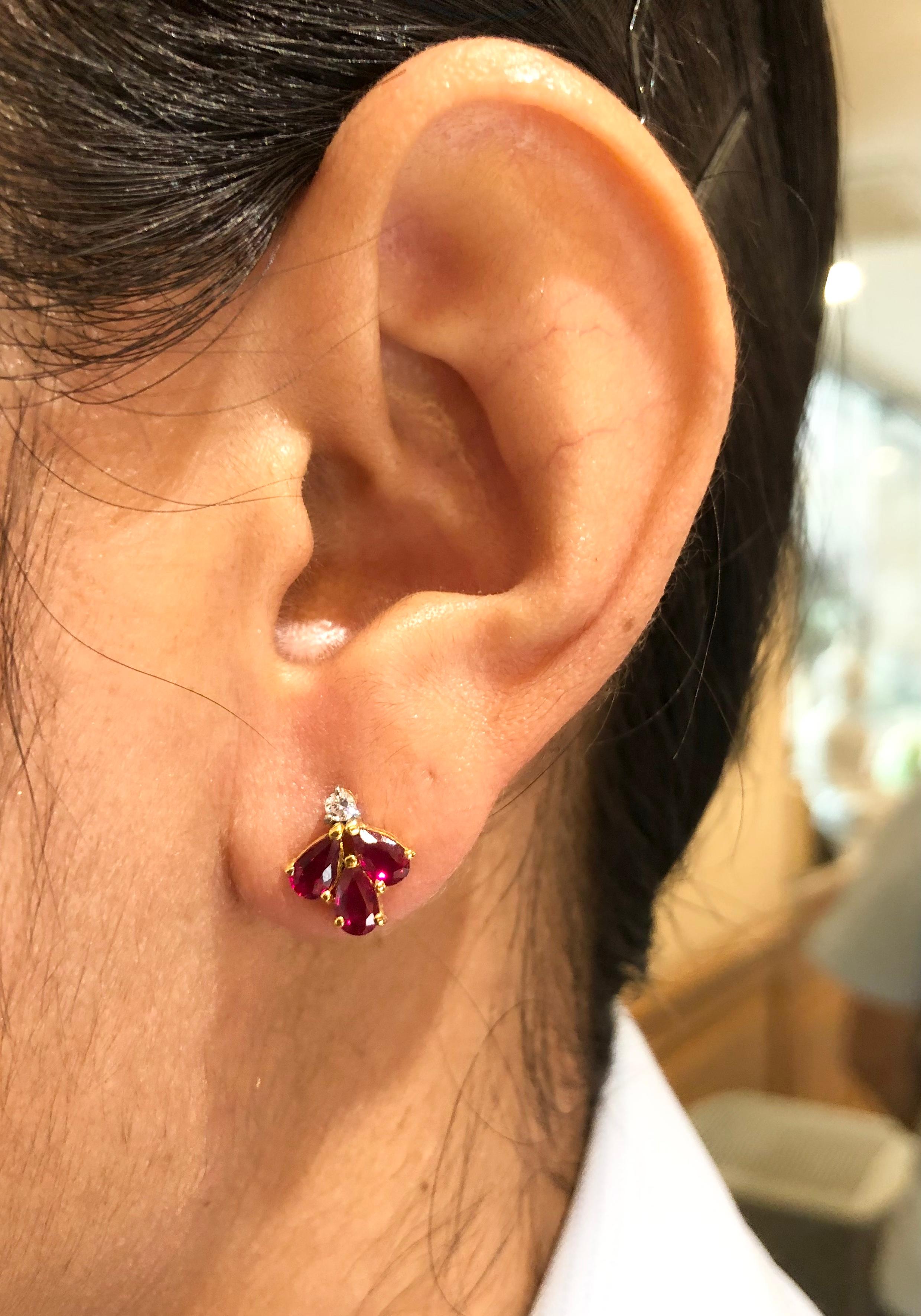 Ruby 1.59 carats with Diamond 0.09 carat Earrings set in 18 Karat Gold Settings

Width:   0.90 cm 
Length:  1.10 cm
Total Weight: 4.0 grams

