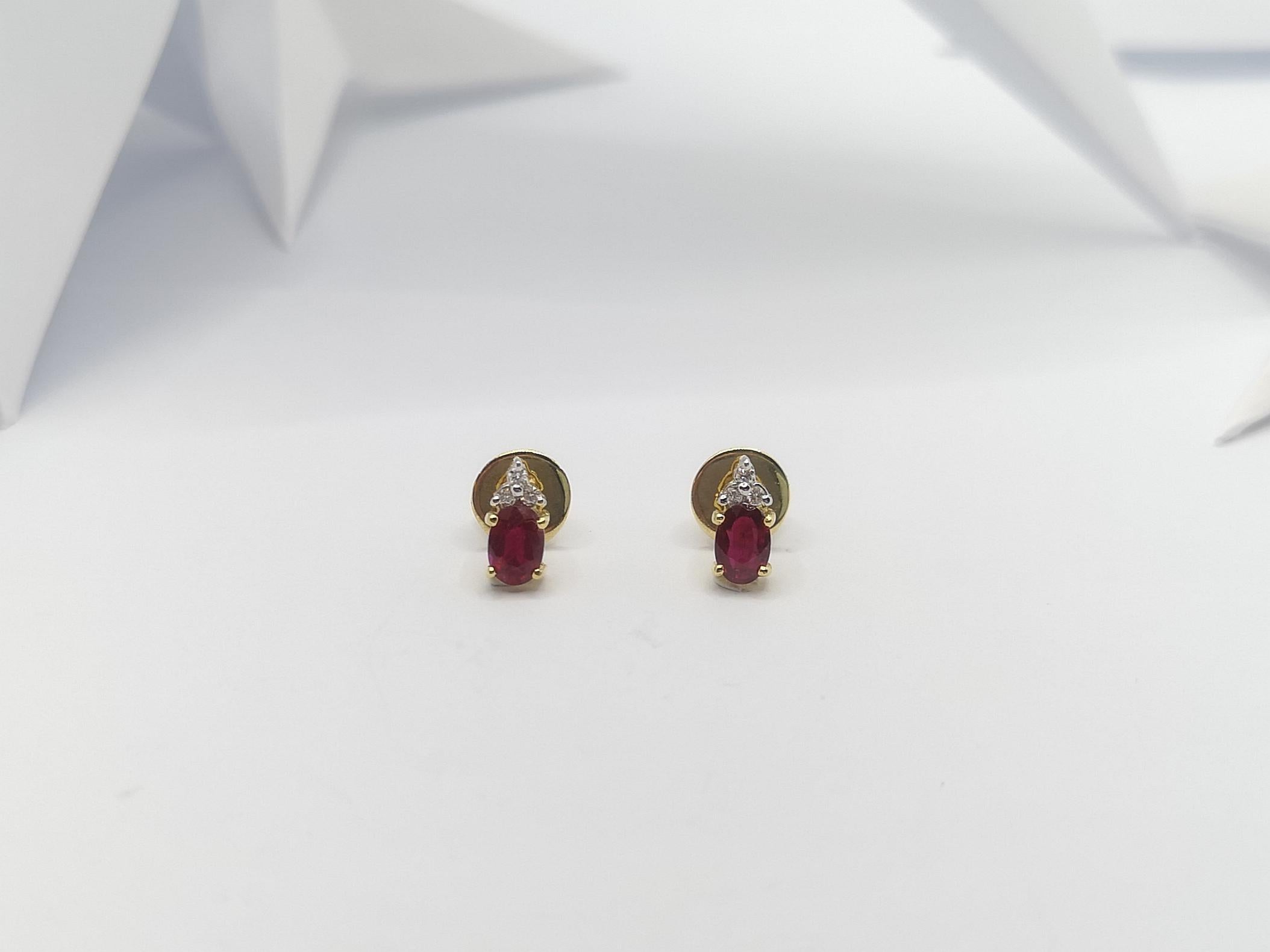 Oval Cut Ruby with Diamond  Earrings set in 18 Karat Gold Settings For Sale
