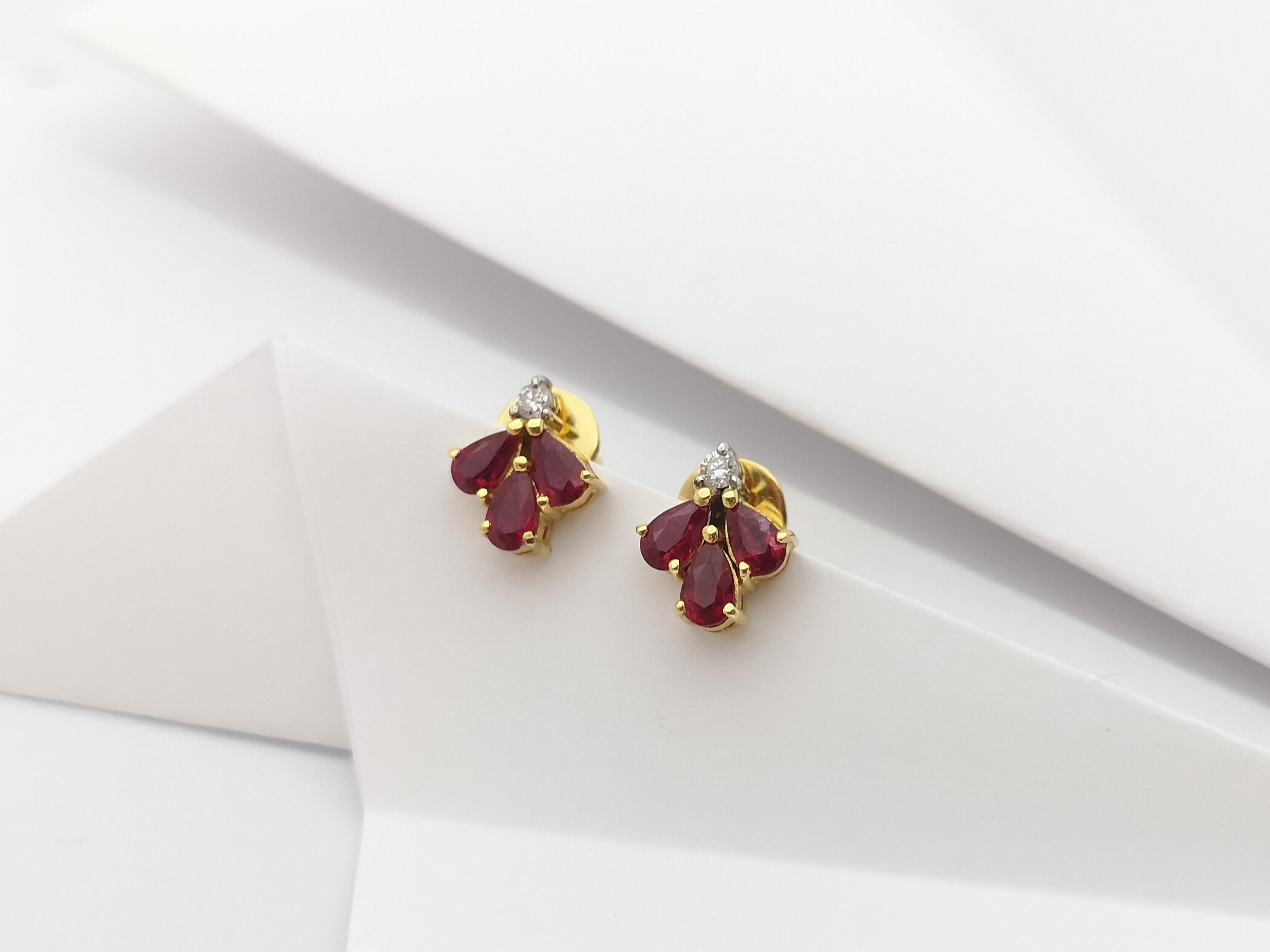 Pear Cut Ruby with Diamond Earrings Set in 18 Karat Gold Settings For Sale