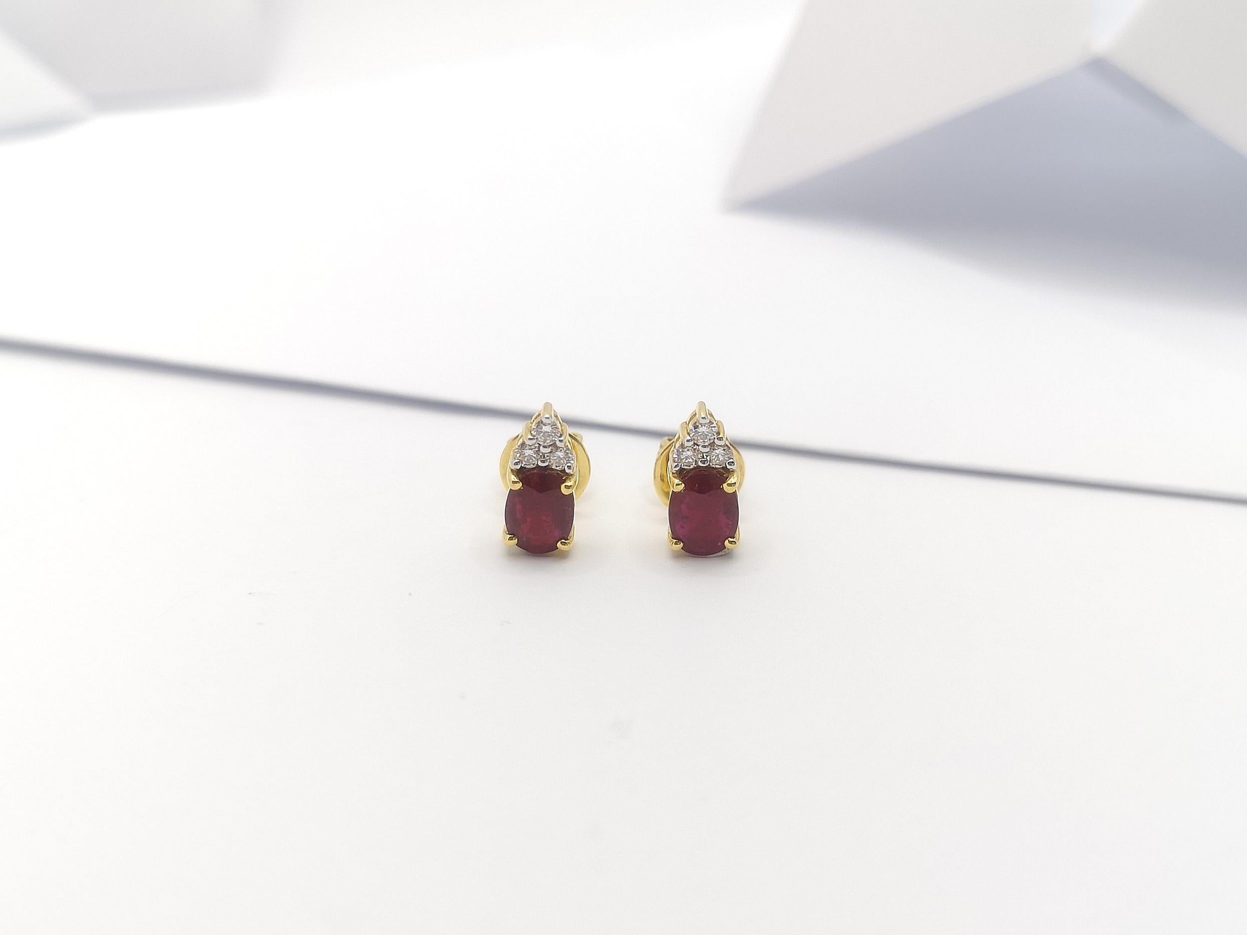 Oval Cut Ruby with Diamond Earrings Set in 18 Karat Gold Settings For Sale