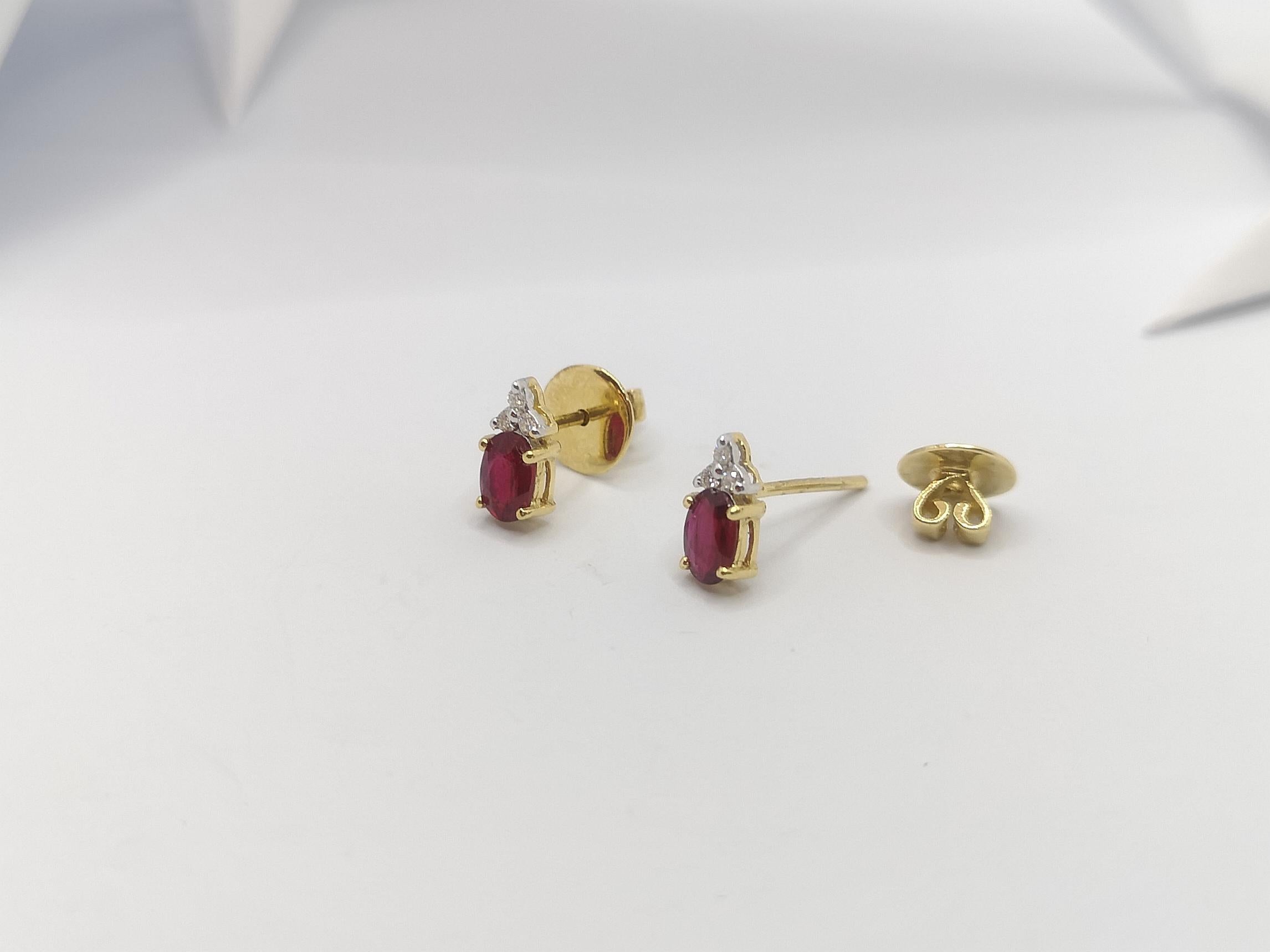 Women's Ruby with Diamond  Earrings set in 18 Karat Gold Settings For Sale