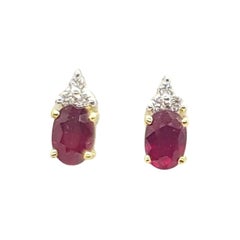 Boucles d'oreilles en or 18 carats serties de rubis et de diamants