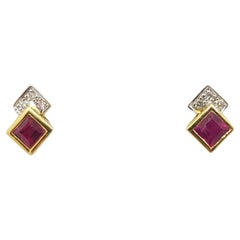 Pendientes de rubí con diamantes engastados en oro de 18 quilates