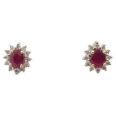 Boucles d'oreilles en or 18 carats serties de rubis et de diamants