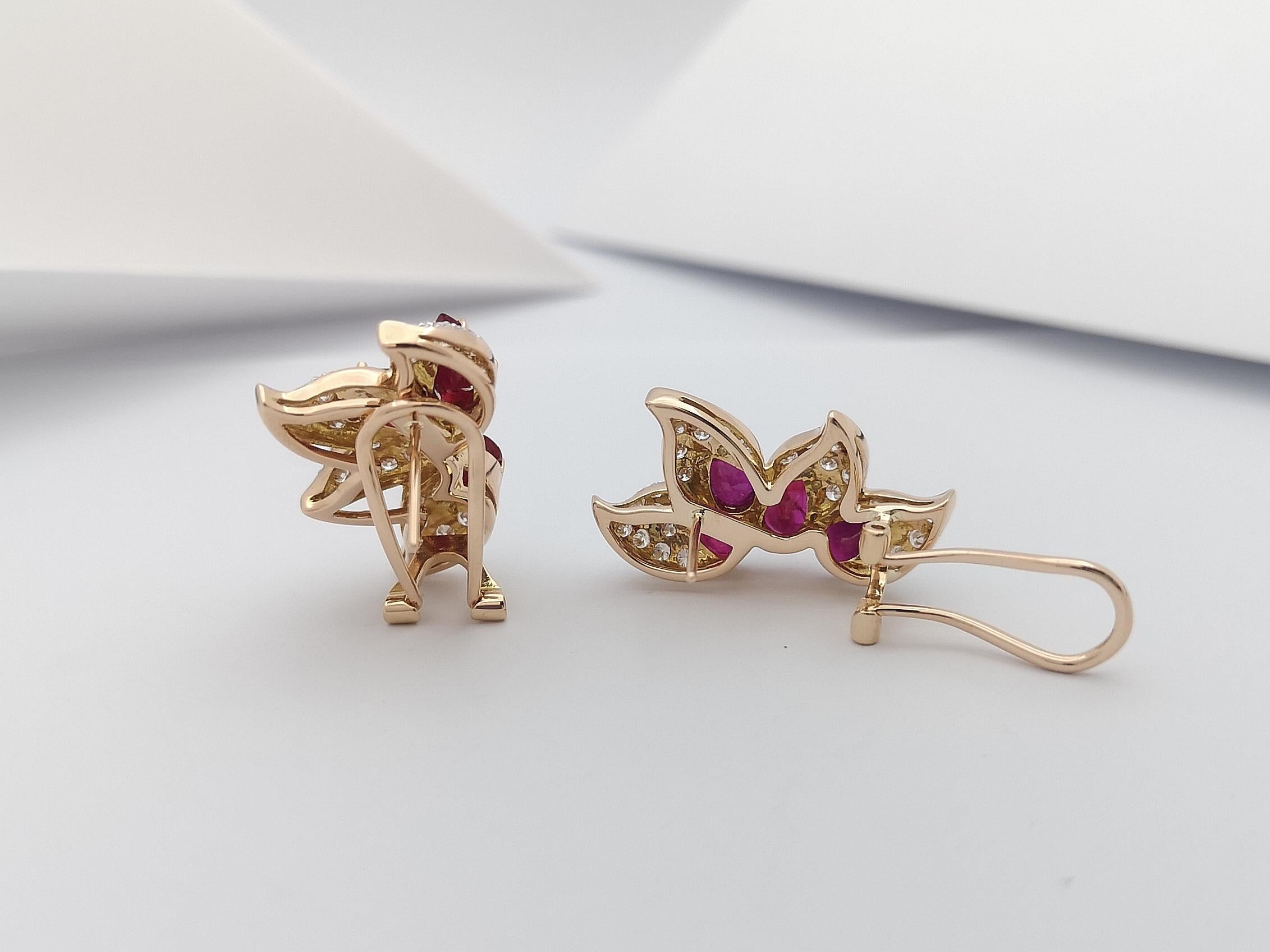 Women's Ruby with Diamond Earrings Set in 18 Karat Rose Gold Settings For Sale