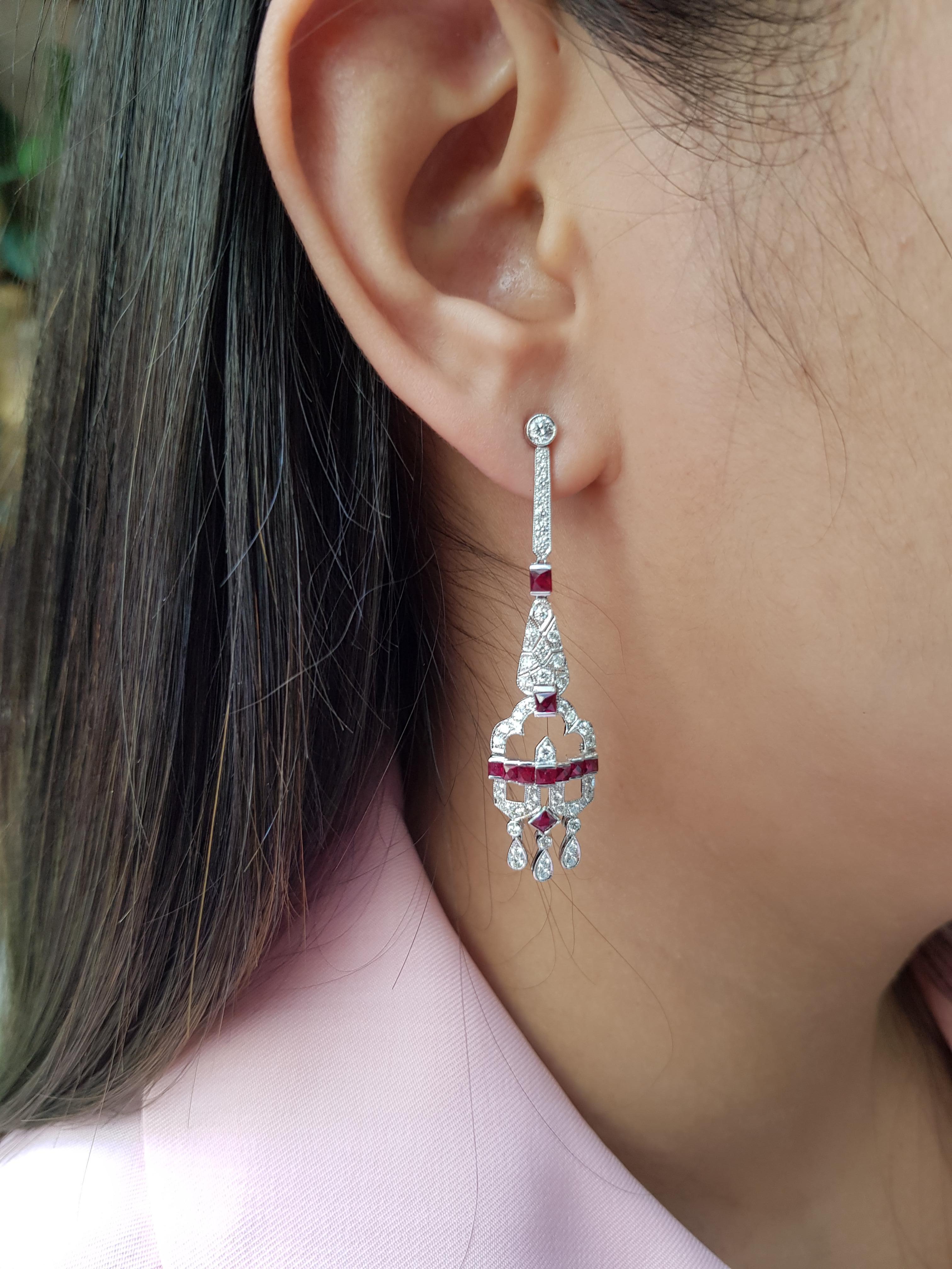 Ruby 1.97 carats with Diamond 1.42 carats Earrings set in 18 Karat White Gold Settings

Width: 1.3 cm
Length: 5.5 cm 

