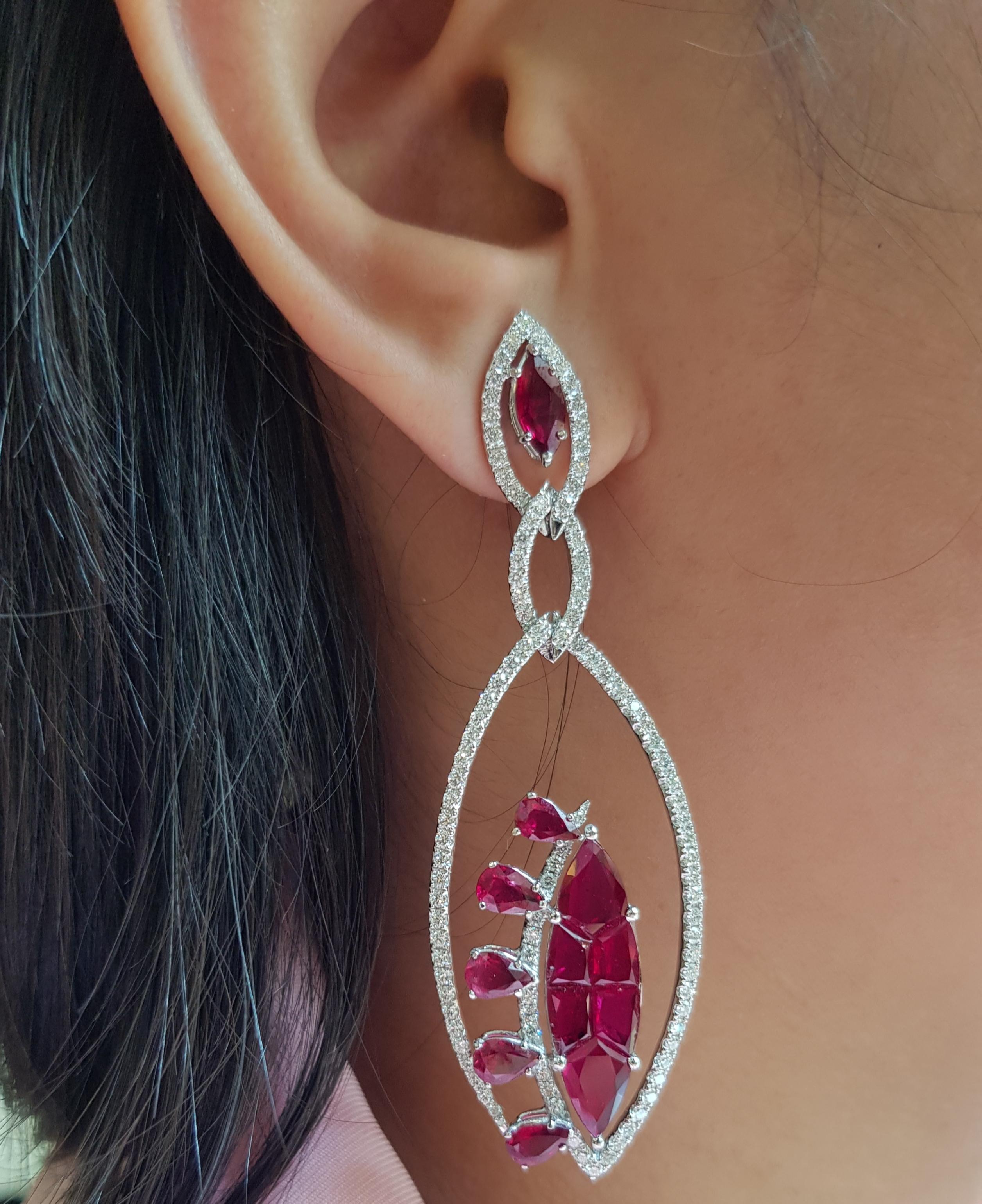 Ruby 15.24 carats with Diamond 2.70 carats Earrings set in 18 Karat White Gold Settings

Width:  2.2 cm 
Length: 7.0 cm
Total Weight: 24.15 grams


