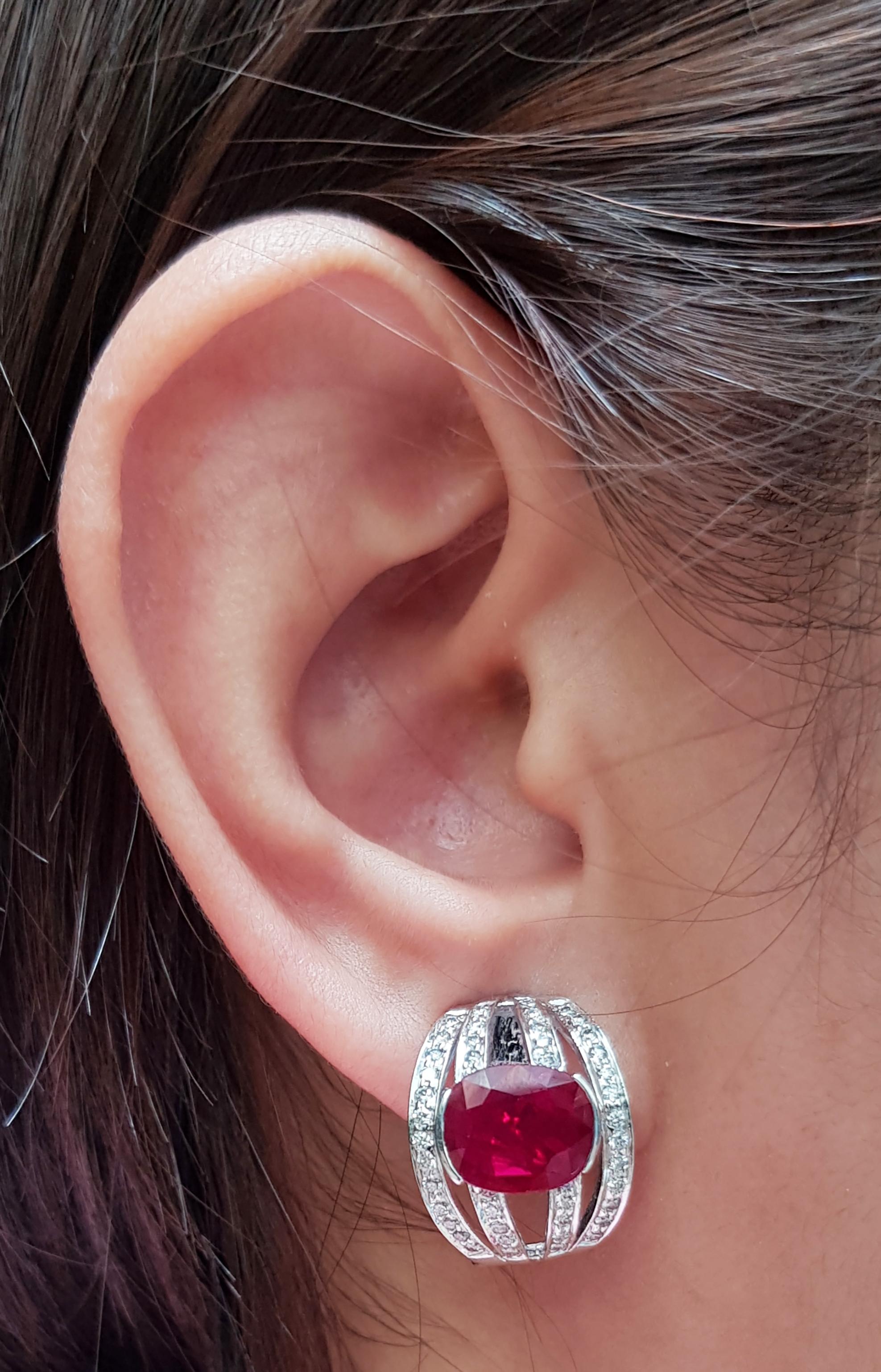 Ruby 4.09 carats with Diamond 0.75 carat Earrings set in 18 Karat White Gold Settings

Width:  1.4 cm 
Length: 2.0 cm
Total Weight: 8.71 grams

