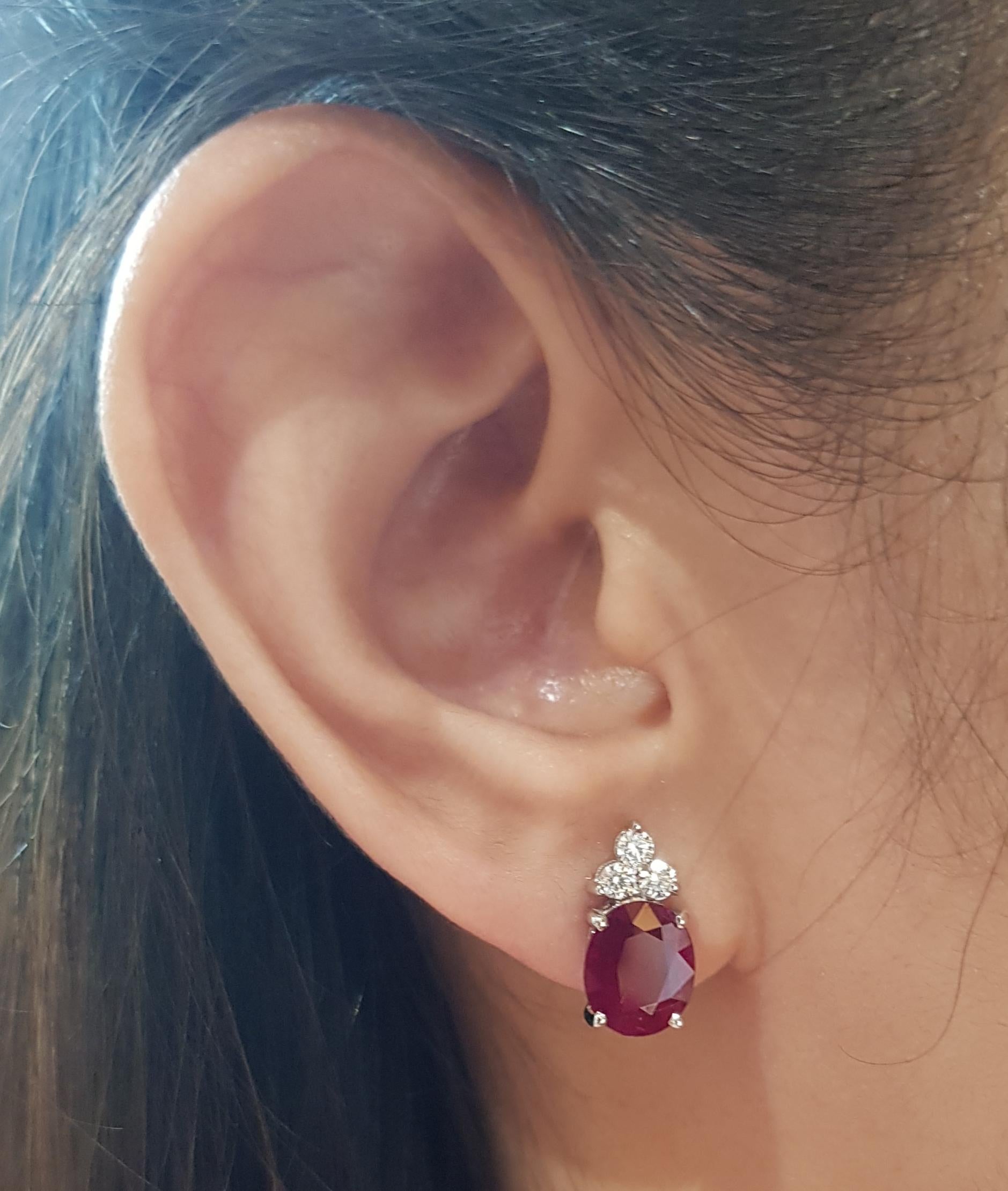 Ruby 4.62 carats with Diamond 0.37 carat Earrings set in 18 Karat White Gold Settings

Width:  0.8 cm 
Length:  1.5 cm
Total Weight: 4.86 grams

