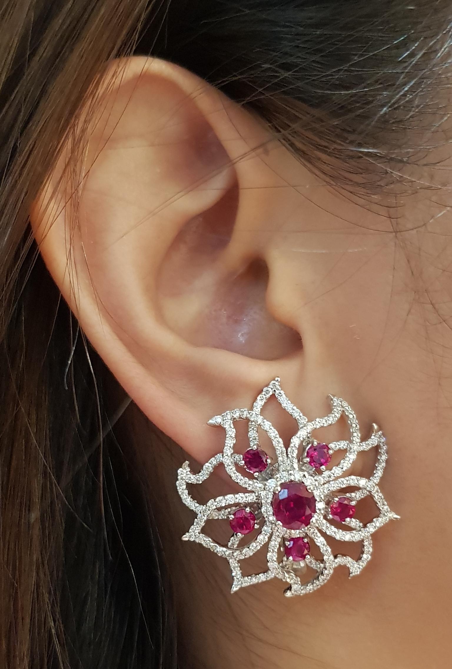 Ruby 2.40 carats with Diamond 2.75 carats and Ruby 2.24 carats Earrings set in 18 Karat White Gold Settings

Width:  3.2 cm 
Length:  2.9 cm
Total Weight: 22.03 grams

