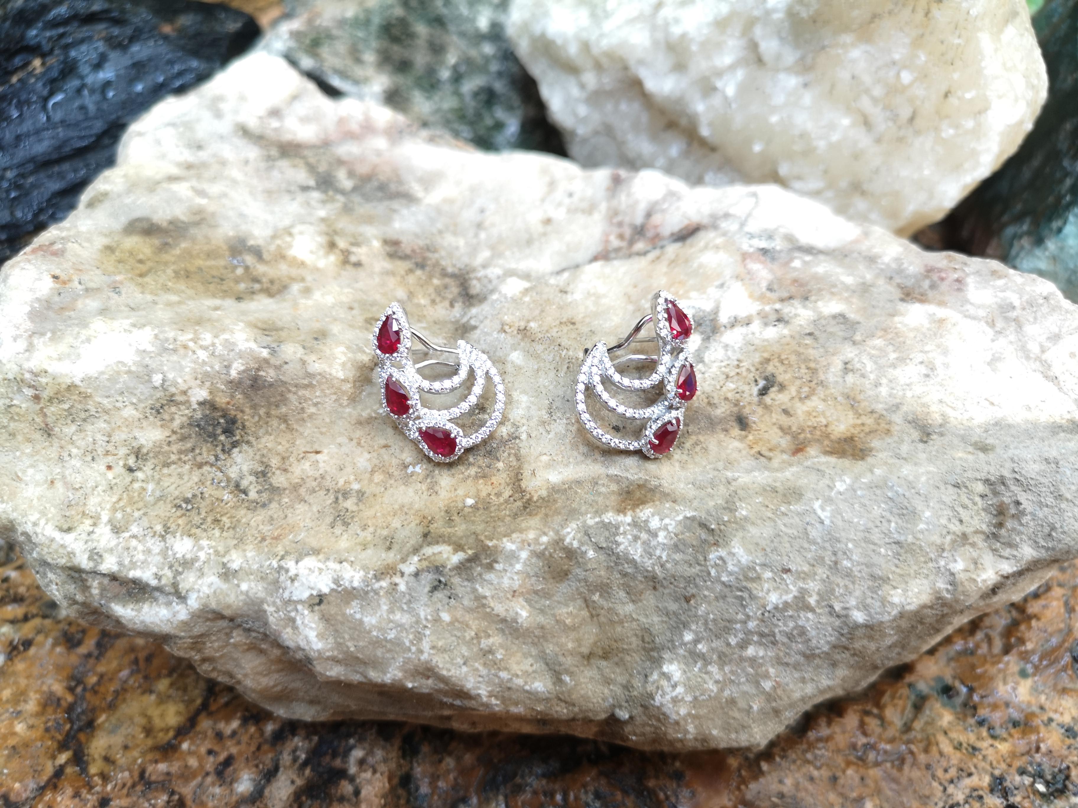 Pear Cut Ruby with Diamond Earrings Set in 18 Karat White Gold Settings