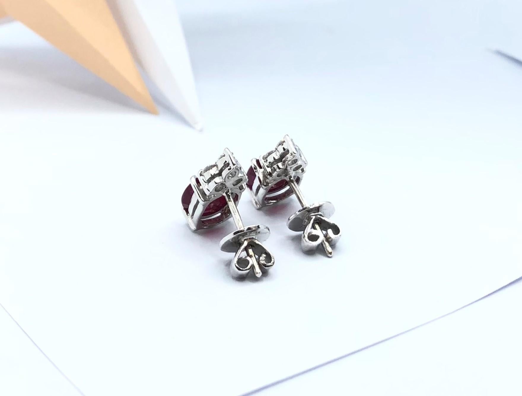 Oval Cut Ruby with Diamond Earrings Set in 18 Karat White Gold Settings For Sale