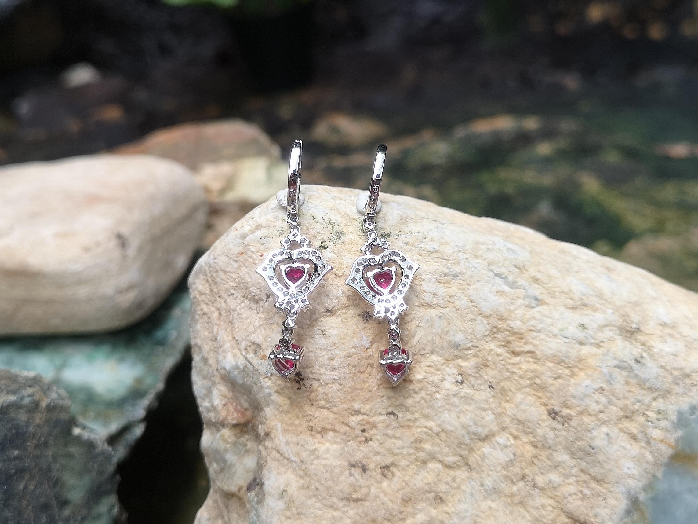 Women's Ruby with Diamond Earrings Set in 18 Karat White Gold Settings For Sale