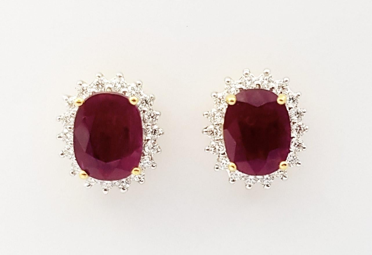 Ruby 3.43 carats with Diamond 0.65 carat Earrings set in 18K Gold Settings

Width: 1.0 cm 
Length: 1.2 cm
Total Weight: 7.17 grams


