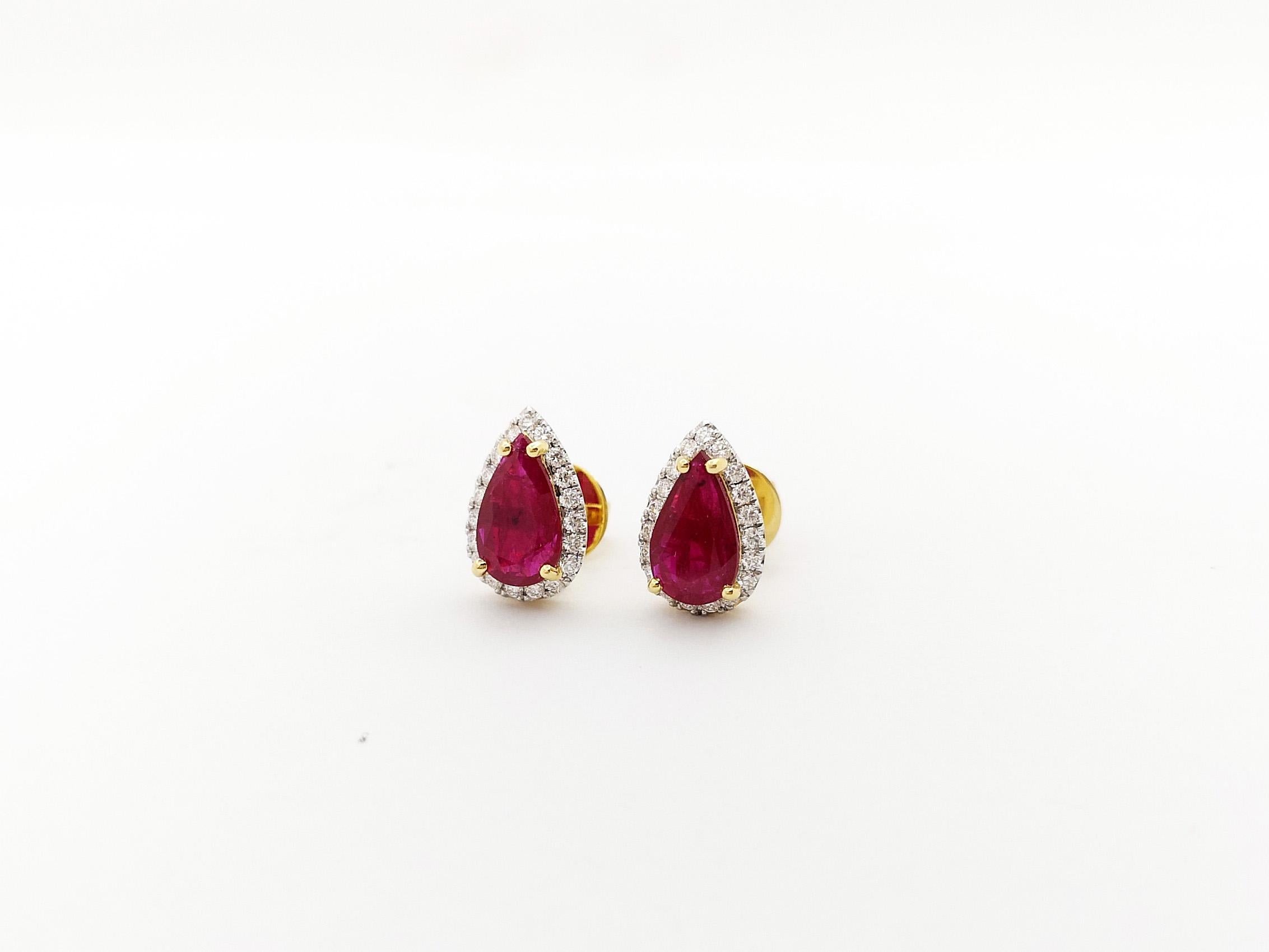 Women's Ruby with Diamond Earrings set in 18K Gold Settings For Sale