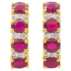 Ruby with Diamond Earrings set in 18K Gold Settings