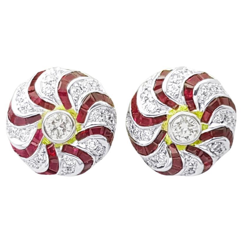Orecchini di rubini e diamanti con montatura in oro 18K