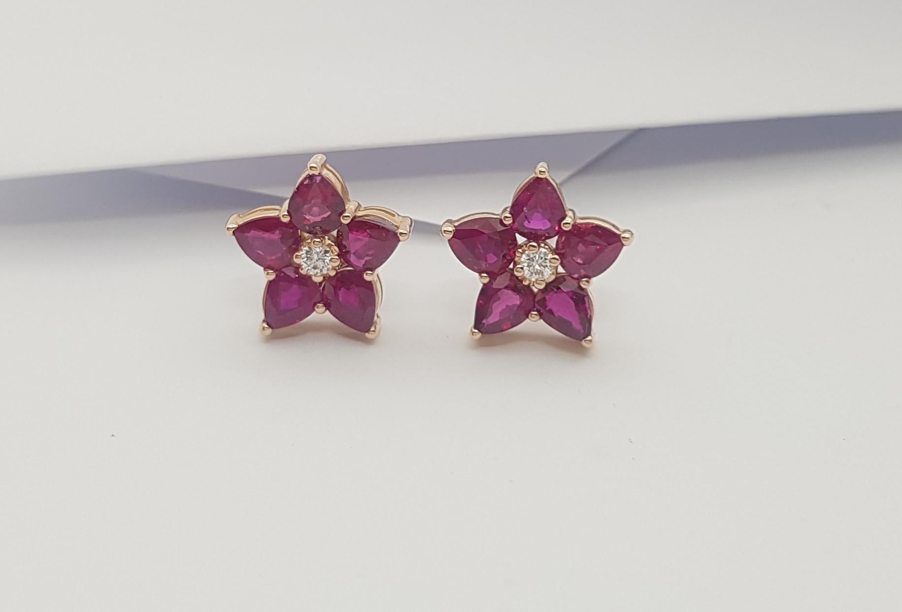 Pear Cut Ruby with Diamond Earrings Set in 18k Rose Gold Settings For Sale