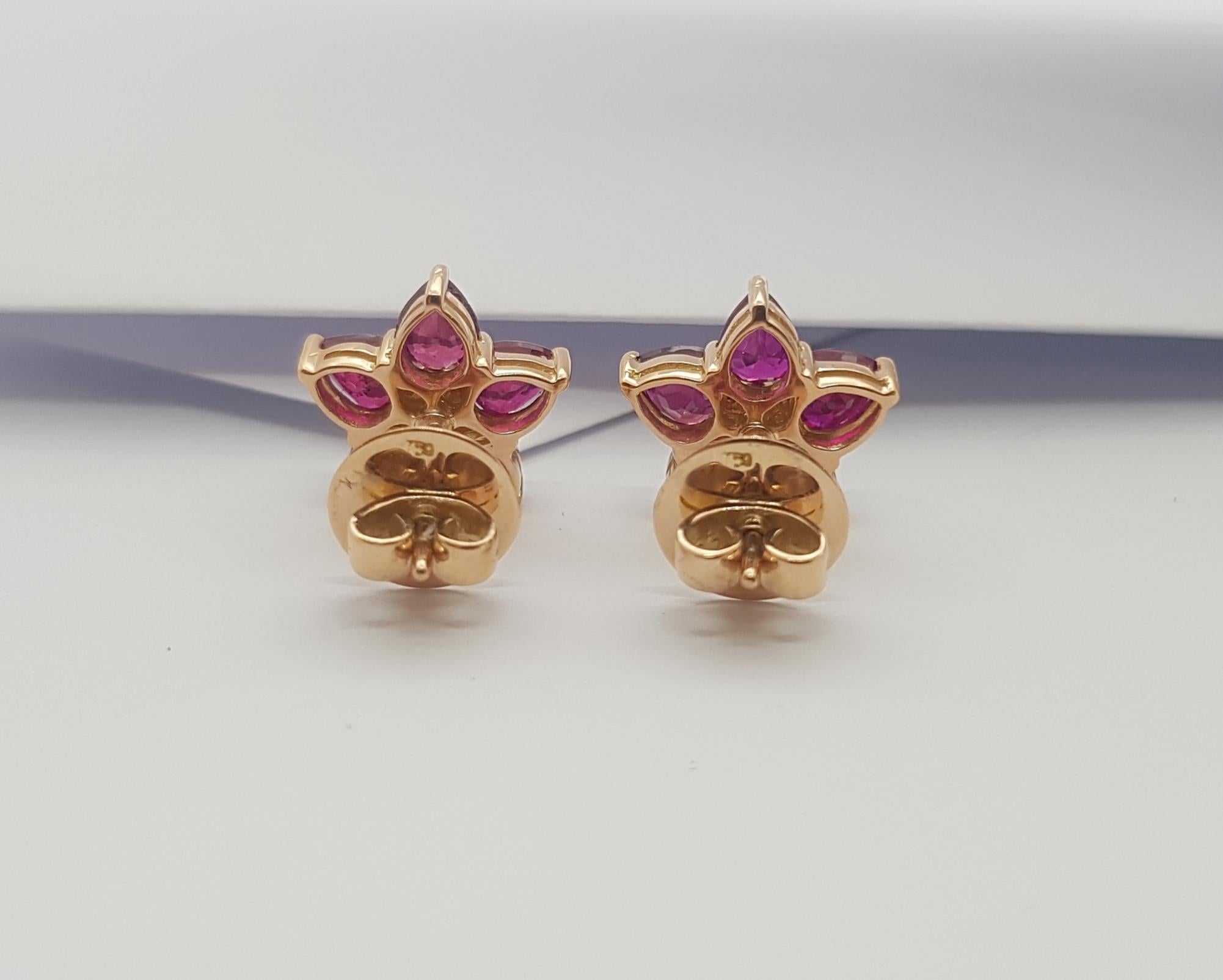 Women's Ruby with Diamond Earrings Set in 18k Rose Gold Settings For Sale