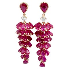 Orecchini di rubini e diamanti con montatura in oro rosa 18 carati