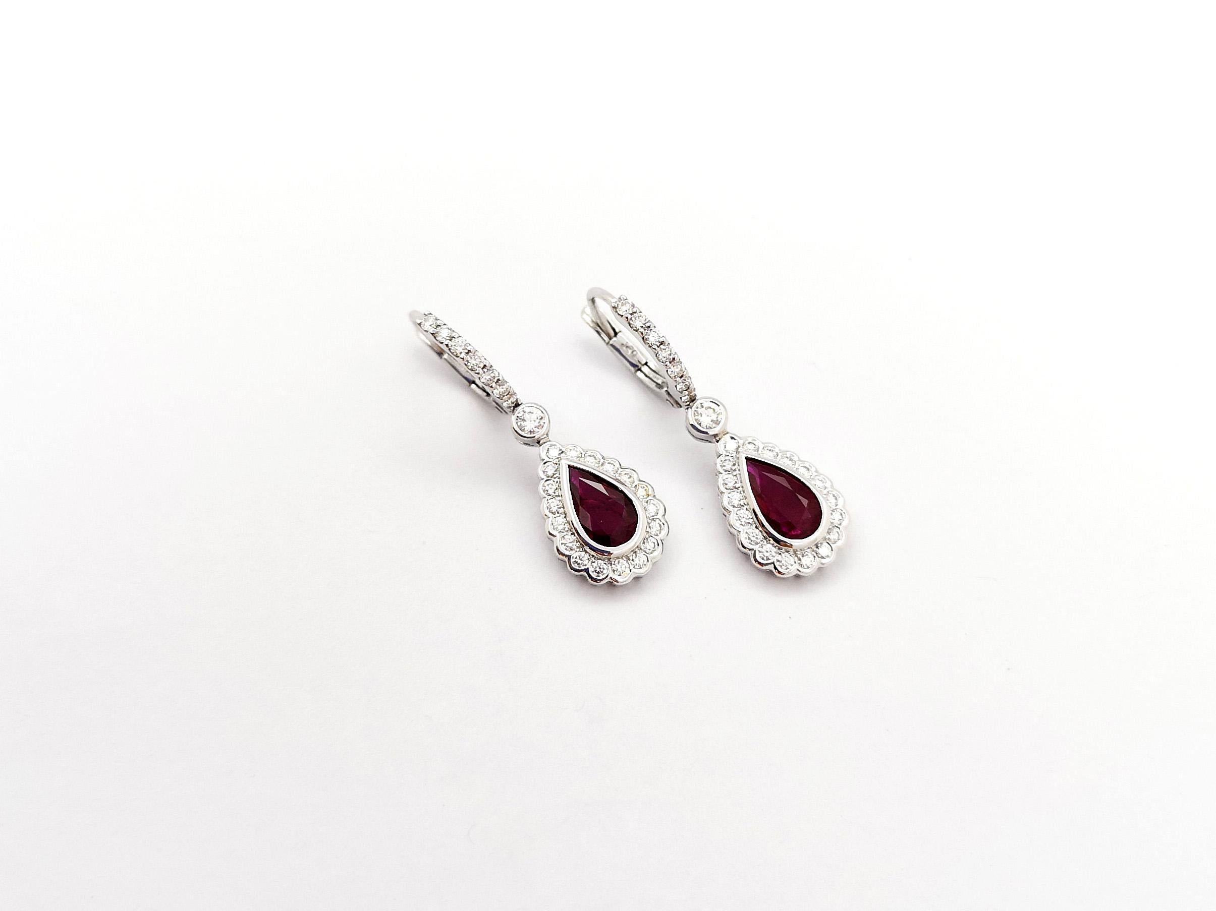Pear Cut Ruby with Diamond Earrings set in 18K White Gold Settings For Sale