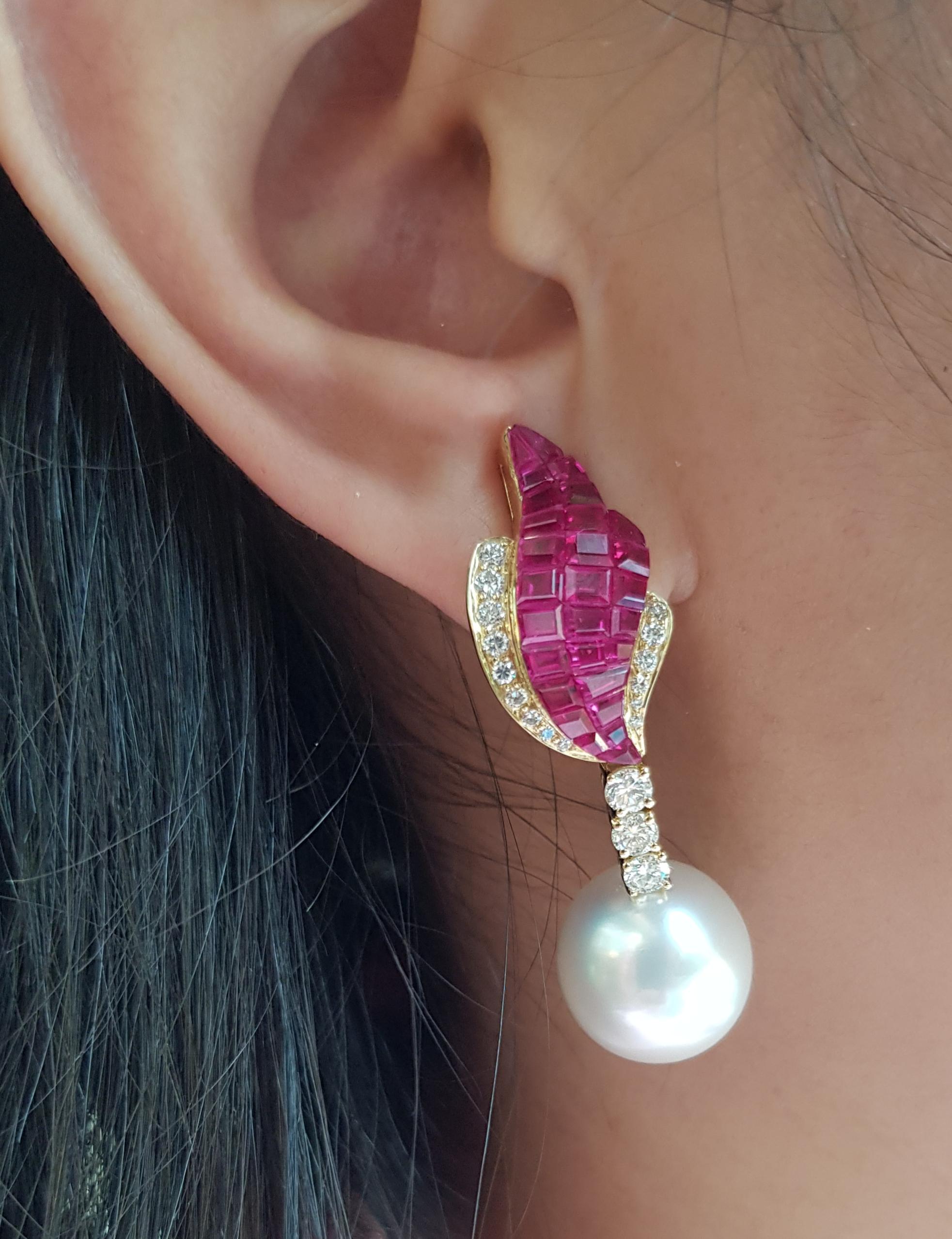 South Sea Pearl, Ruby 15.72 carats with Diamond 1.06 carats Earrings set in 18 Karat Gold Settings

Width:  1.3 cm 
Length: 4.5 cm
Total Weight: 22.05 grams

