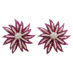 Boucles d'oreilles fleurs en or 18 carats avec rubis et diamants