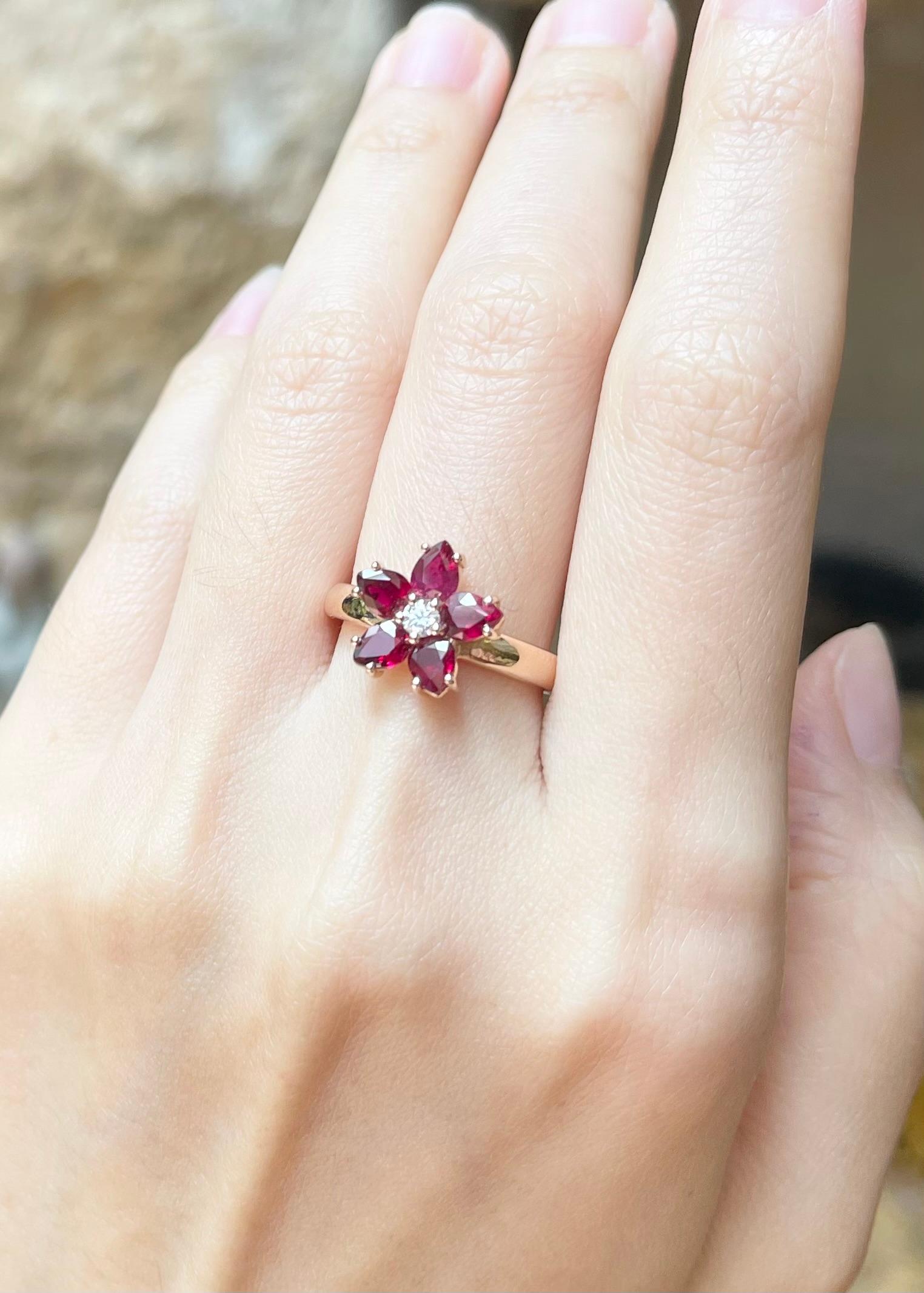 Women's Ruby with Diamond Flower Ring set in 18K Rose Gold Settings For Sale