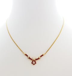 Collier en or 18 carats avec rubis et diamants