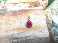 Ruby with Diamond Pendant set in 18 Karat Gold Settings