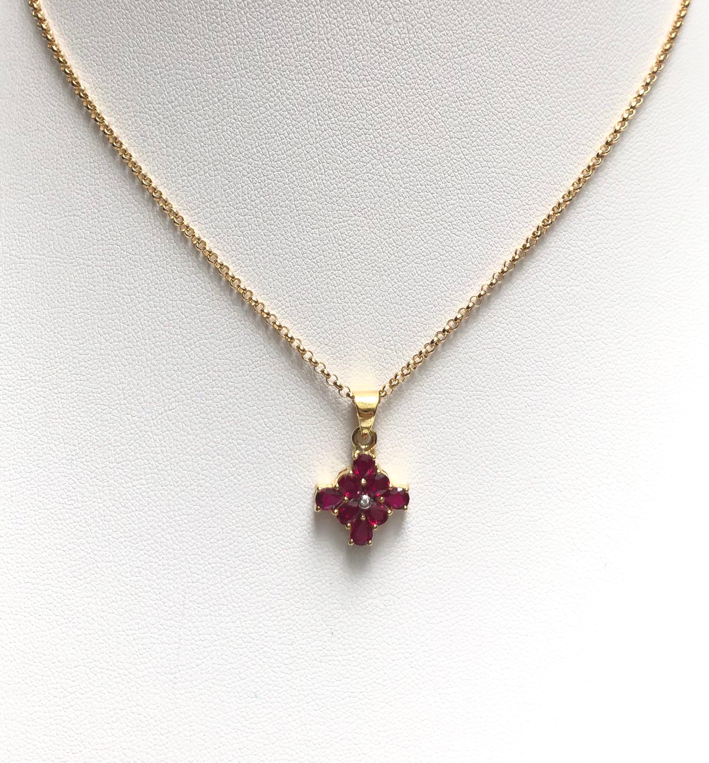 Ruby 1.40 carats with Diamond 0.01 carat Pendant set in 18 Karat Gold Settings
(chain not included)

Width:  1.4 cm 
Length: 2.1 cm
Total Weight: 2.29 grams

