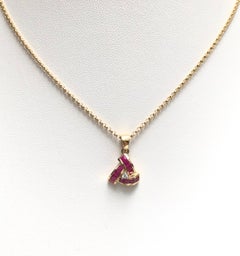 Ruby with Diamond Pendant Set in 18 Karat Gold Settings