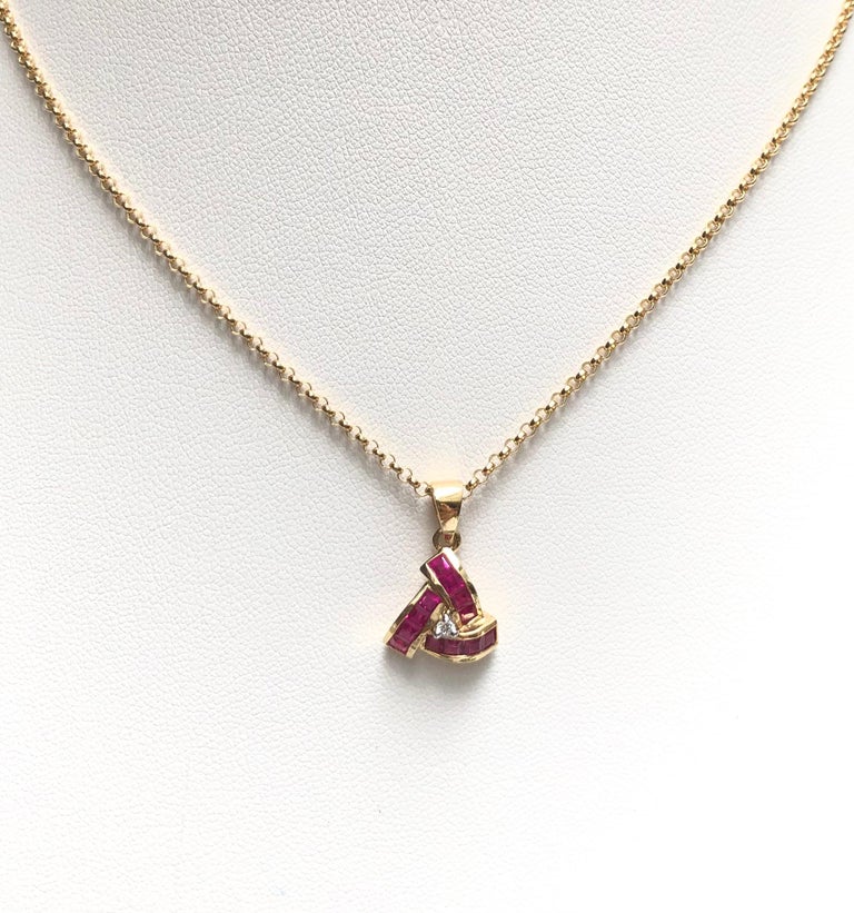 Ruby 0.90 carat with Diamond 0.03 carat Pendant set in 18 Karat Gold Settings
(chain not included)

Width:  1.2 cm 
Length: 1.8 cm
Total Weight: 2.08 grams

