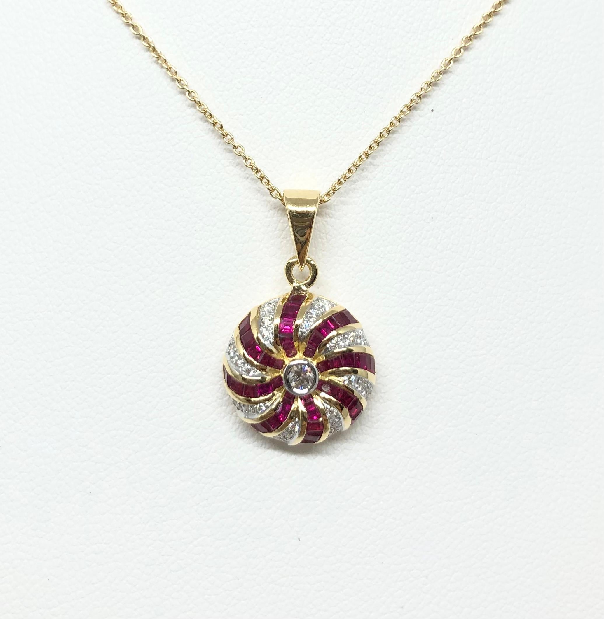 Ruby 1.10 carats with Diamond 0.03 carat Pendant set in 18 Karat Gold Settings
(chain not included)

Width: 1.4 cm 
Length: 2.1 cm
Total Weight: 2.94 grams

