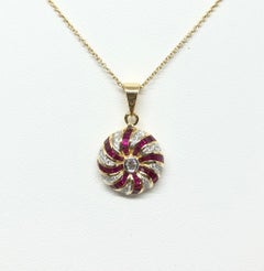 Ruby with Diamond Pendant Set in 18 Karat Gold Settings